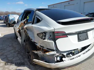 2023 Tesla Model X Plaid with VIN 7SAXCBE63PF405105, listed as a IAAI auction lot 41876918 with 22,475 mi miles and . Bid and sale history available at DreamBid. Image 6.