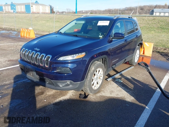 2015 Jeep Cherokee Latitude with VIN 1C4PJMCS0FW583658, listed as a IAAI auction lot 41106819 with 101,849 mi miles. Bid and sale history available at carsss.com. Image 17.