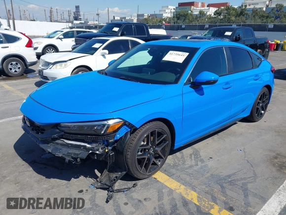 2024 Honda Civic Sport Touring z VIN 19XFL1G85RE026665, wystawiony jako IAAI lot #41735645 z przebiegiem 5025 mil mil oraz . Historia ofert i sprzedaży dostępna na DreamBid. Obrazek 2.