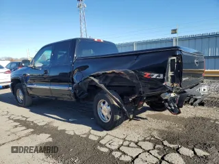 2000 GMC New Sierra 1500 SLE with VIN 2GTEK19T6Y1328851, listed as a Copart auction lot 82308104 with 153,321 mi miles and Salvage Title. Bid and sale history available at carsss.com. Image 2.
