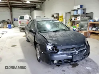 2004 Dodge Neon SXT with VIN 1B3ES56CX4D596703, listed as a Copart auction lot 51340445 with 184,207 mi miles and Salvage Title. Bid and sale history available at carsss.com. Image 11.