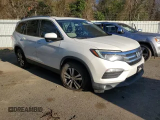 2016 Honda Pilot EX-L with VIN 5FNYF5H70GB024908, listed as a Copart auction lot 43238705 with 156,412 mi miles and Salvage Title. Bid and sale history available at DreamBid. Image 4.