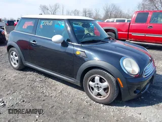 2007 MINI Hardtop with VIN WMWMF33567TT53664, listed as a IAAI auction lot 42027768 with 75,970 mi miles and . Bid and sale history available at DreamBid. Image 1.