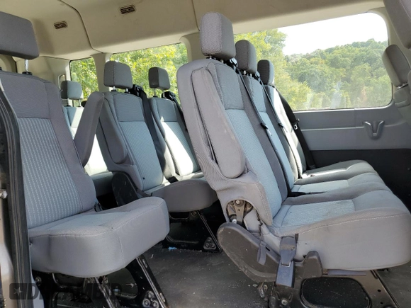 2018 Ford Transit Passenger XL с VIN 1FBAX2CG4JKB49963, выставлен на аукционе Copart как лот 69033884 с пробегом 205 105 миль миль и Списание • Salvage title. История ставок и продаж доступна на DreamBid. Изображение 11.