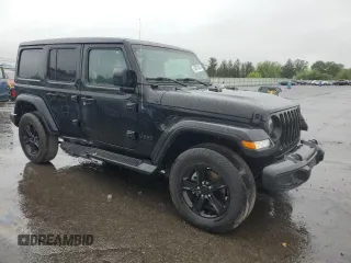 2022 Jeep Wrangler Unlimited Sahara with VIN 1C4HJXEGXNW211886, listed as a Copart auction lot 54877645 with 64,815 mi miles and Salvage title. Bid and sale history available at DreamBid. Image 4.