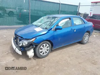 2009 Toyota Corolla with VIN JTDBL40E399046515, listed as a IAAI auction lot 42154947 with 153,041 mi miles. Bid and sale history available at carsss.com. Image 2.