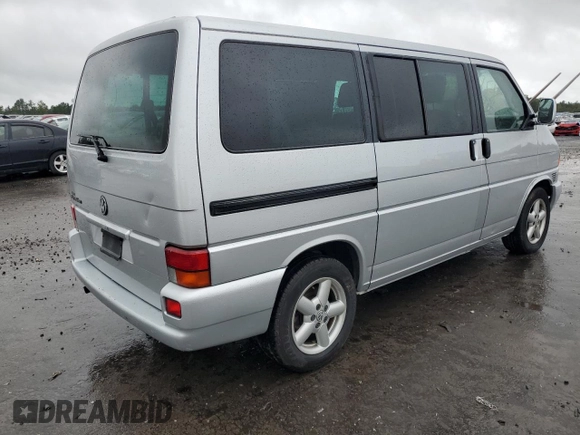 2003 Volkswagen EuroVan с VIN WV2KB47093H041606, выставлен на аукционе Copart как лот 73808224 с пробегом 228 496 миль миль и Чистый • Clean title. История ставок и продаж доступна на DreamBid. Изображение 3.