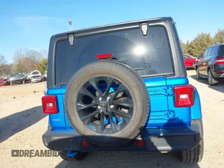 2022 Jeep Wrangler Unlimited Sahara z VIN 1C4JJXP64NW192452, wystawiony jako IAAI lot #41631295 z przebiegiem 23 738 mil mil oraz . Historia ofert i sprzedaży dostępna na DreamBid. Obrazek 16.