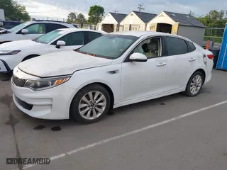 2016 Kia Optima EX with VIN 5XXGU4L38GG008436, listed as a IAAI auction lot 42094498 with 134,781 mi miles. Bid and sale history available at carsss.com. Image 2.
