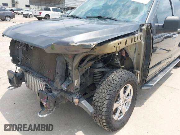 2018 Ford F-150 XL with VIN 1FTEW1EGXJKD18696, listed as a IAAI auction lot 42128458 with 80,811 mi miles and . Bid and sale history available at DreamBid. Image 6.