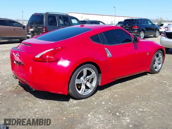 2009 Nissan 370Z Touring with VIN JN1AZ44E69M405179, listed as a IAAI auction lot 41762303 with 132,853 mi miles and . Bid and sale history available at DreamBid. Image 4.