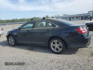 2014 Ford Taurus SEL with VIN 1FAHP2E87EG151866, listed as a Copart auction lot 52692965 with 201,680 mi miles and Clean Title. Bid and sale history available at DreamBid. Image 2.