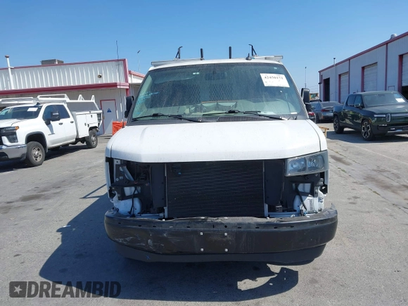 2023 Chevrolet Express Cargo with VIN 1GCWGAFP2P1100606, listed as a IAAI auction lot 42450171 with 34,000 mi miles and . Bid and sale history available at DreamBid. Image 13.