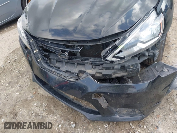 2018 Nissan Sentra S with VIN 3N1AB7AP5JY211272, listed as a IAAI auction lot 41941030 with 264,501 mi miles and . Bid and sale history available at DreamBid. Image 18.