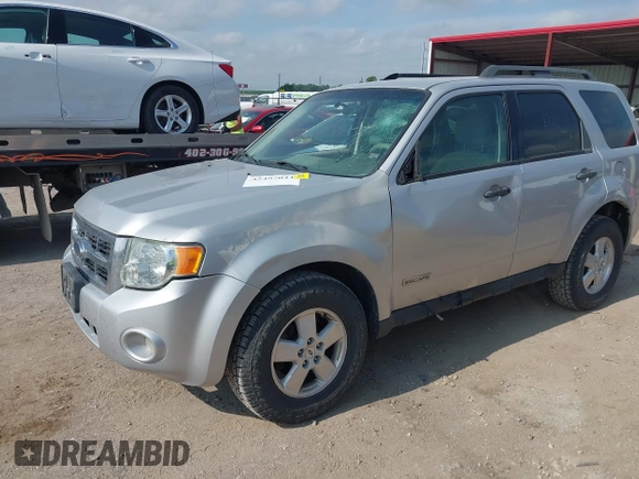 2008 Ford Escape XLT with VIN 1FMCU93188KD05798, listed as a IAAI auction lot 42497044 with 215,954 mi miles and . Bid and sale history available at DreamBid. Image 2.