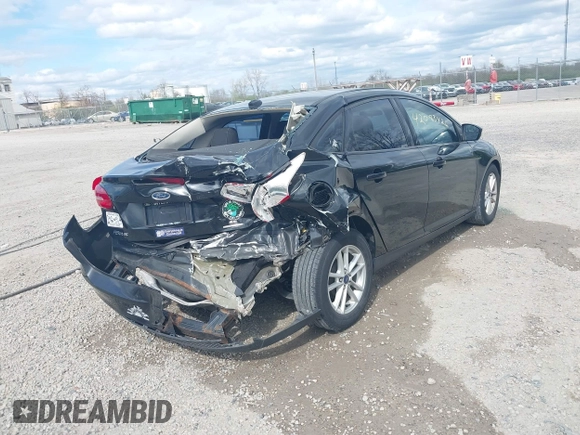 2015 Ford Focus SE with VIN 1FADP3F2XFL313187, listed as a IAAI auction lot 42083426 with 96,562 mi miles and . Bid and sale history available at carsss.com. Image 4.