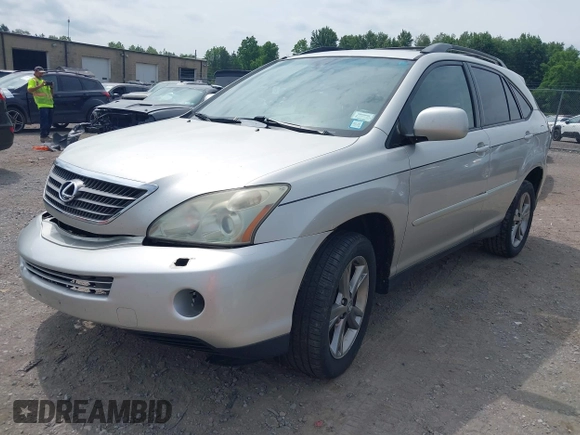 2006 Lexus RX 400h with VIN JTJHW31U260002052, listed as a IAAI auction lot 42487866 with 160,256 mi miles and . Bid and sale history available at DreamBid. Image 2.