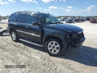 2007 GMC Envoy SLE with VIN 1GKDS13S472107120, listed as a Copart auction lot 42393475 with 106,499 mi miles and Salvage Title. Bid and sale history available at carsss.com. Image 4.