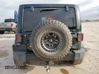2012 Jeep Wrangler Unlimited Altitude with VIN 1C4HJWEGXCL180602, listed as a Copart auction lot 61391095 with 187,205 mi miles and Salvage title. Bid and sale history available at DreamBid. Image 6.