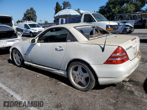 2001 Mercedes-Benz SLK 230 Kompressor с VIN WDBKK49F71F205264, выставлен на аукционе Copart как лот 64061865 с пробегом Не указан миль и Списание • Salvage title. История ставок и продаж доступна на DreamBid. Изображение 2.