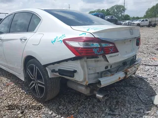 2017 Honda Accord Touring with VIN 1HGCR3F98HA003410, listed as a IAAI auction lot 42534659 with 211,470 mi miles and . Bid and sale history available at DreamBid. Image 6.