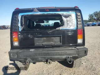 2003 Hummer H2 with VIN 5GRGN23UX3H136571, listed as a Copart auction lot 80823054 with 220,003 mi miles and Salvage Title. Bid and sale history available at carsss.com. Image 6.