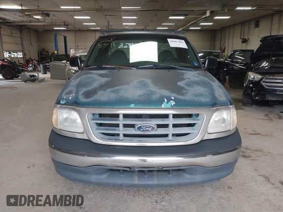 2000 Ford F-150 XL with VIN 2FTZF1722YCA27112, listed as a IAAI auction lot 42687404 with Not provided miles and . Bid and sale history available at DreamBid. Image 13.