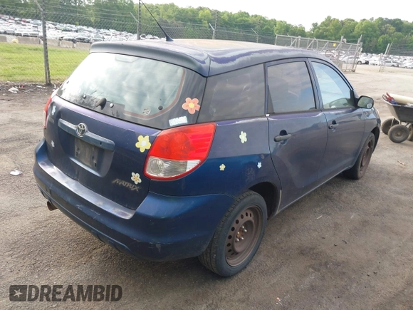 2003 Toyota Matrix Std with VIN 2T1KR32EX3C012210, listed as a IAAI auction lot 42152686 with 299,999 mi miles. Bid and sale history available at carsss.com. Image 4.