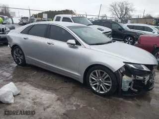2014 Lincoln MKZ with VIN 3LN6L2G9XER814581, listed as a IAAI auction lot 41664814 with 153,449 mi miles. Bid and sale history available at carsss.com. Image 1.