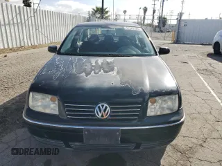 2004 Volkswagen Jetta GL z VIN 3VWRK69M54M092295, wystawiony jako Copart lot #47320195 z przebiegiem 161 593 mil mil oraz Szkoda całkowita • Salvage title. Historia ofert i sprzedaży dostępna na DreamBid. Obrazek 5.