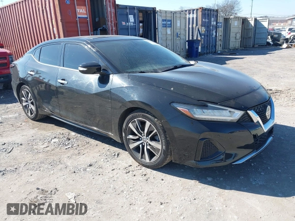 2019 Nissan Maxima Platinum z VIN 1N4AA6AV0KC365901, wystawiony jako IAAI lot #41473793 z przebiegiem 137 772 mil mil oraz . Historia ofert i sprzedaży dostępna na DreamBid. Obrazek 1.