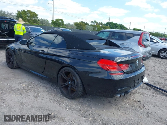 2014 BMW M6 with VIN WBSLZ9C52EDZ78748, listed as a IAAI auction lot 42152435 with 57,150 mi miles and . Bid and sale history available at DreamBid. Image 3.