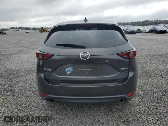 2020 Mazda CX-5 Grand Touring with VIN JM3KFADM6L0839527, listed as a Copart auction lot 46677475 with 50,305 mi miles and Salvage Title. Bid and sale history available at DreamBid. Image 6.
