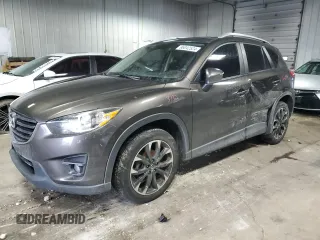2016 Mazda CX-5 Grand Touring z VIN JM3KE4DY1G0623159, wystawiony jako Copart lot #86042524 z przebiegiem 94 286 mil mil oraz Nie do naprawy • Non repairable. Historia ofert i sprzedaży dostępna na DreamBid. Obrazek 1.