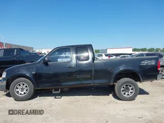 1999 Ford F-150 XL with VIN 1FTRX18L3XKA77743, listed as a IAAI auction lot 42512532 with Not provided miles and . Bid and sale history available at DreamBid. Image 15.
