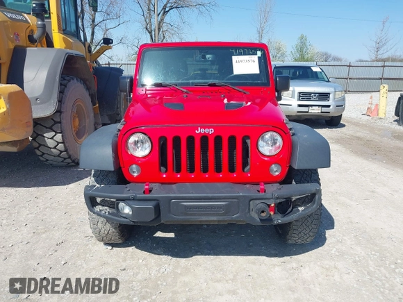 2015 Jeep Wrangler Unlimited Rubicon Hard Rock with VIN 1C4HJWFG9FL525556, listed as a IAAI auction lot 41973576 with 246,949 mi miles and . Bid and sale history available at DreamBid. Image 12.