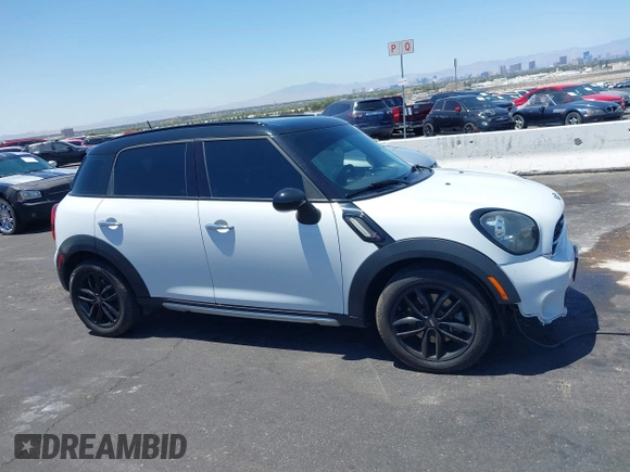 2015 MINI Countryman S with VIN WMWZC3C58FWT05613, listed as a IAAI auction lot 42374870 with 124,214 mi miles and . Bid and sale history available at DreamBid. Image 12.