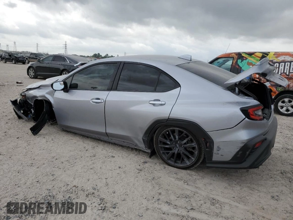 2024 Subaru WRX Premium with VIN JF1VBAH64R9808221, listed as a Copart auction lot 54990545 with 105,565 mi miles and Salvage title. Bid and sale history available at DreamBid. Image 2.