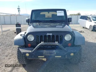 2009 Jeep Wrangler X with VIN 1J4FA24159L768617, listed as a IAAI auction lot 41686830 with 100,478 mi miles and . Bid and sale history available at DreamBid. Image 6.