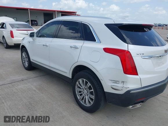 2017 Cadillac XT5 Luxury FWD z VIN 1GYKNBRS0HZ194069, wystawiony jako IAAI lot #42688346 z przebiegiem Nie podano mil oraz . Historia ofert i sprzedaży dostępna na DreamBid. Obrazek 3.