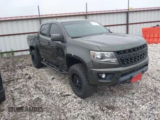 2018 Chevrolet Colorado 4WD LT z VIN 1GCGTCEN2J1235085, wystawiony jako IAAI lot #42192629 z przebiegiem 83 914 mil mil oraz . Historia ofert i sprzedaży dostępna na DreamBid. Obrazek 1.