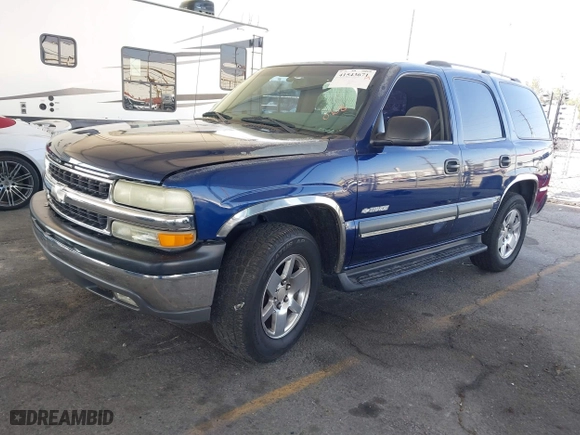 2003 Chevrolet Tahoe LT with VIN 1GNEC13T03J180708, listed as a IAAI auction lot 41543671 with 203,442 mi miles. Bid and sale history available at carsss.com. Image 2.