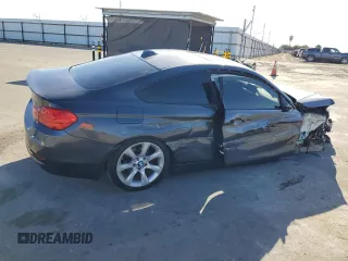 2015 BMW 4 Series 428i with VIN WBA3N7C54FK222324, listed as a Copart auction lot 57644345 with 114,696 mi miles and Salvage title. Bid and sale history available at DreamBid. Image 3.