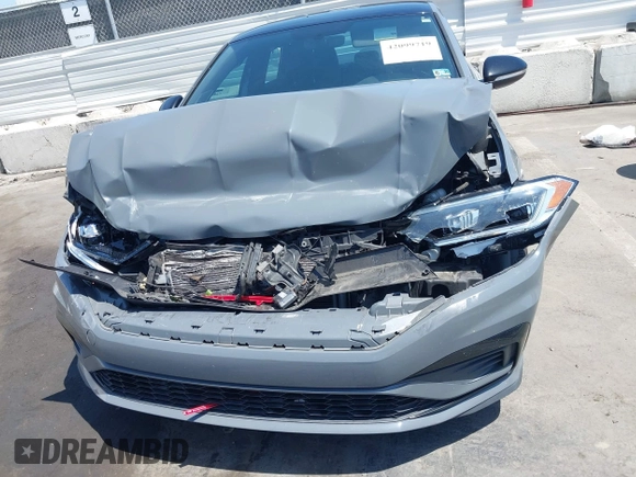 2019 Volkswagen Jetta GLI S z VIN 3VW6T7BU9KM153175, wystawiony jako IAAI lot #42099719 z przebiegiem 90 608 mil mil oraz . Historia ofert i sprzedaży dostępna na DreamBid. Obrazek 12.