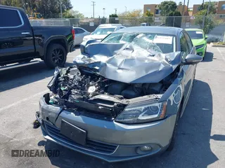 2013 Volkswagen Jetta Hybrid SE with VIN 3VW637AJ1DM232687, listed as a IAAI auction lot 41973407 with 70,428 mi miles and . Bid and sale history available at DreamBid. Image 17.
