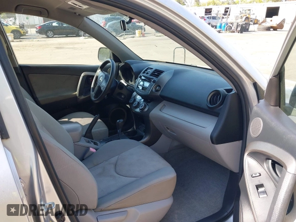 2009 Toyota RAV4 with VIN JTMBF33V59D009024, listed as a IAAI auction lot 39425315 with 116,830 mi miles. Bid and sale history available at carsss.com. Image 5.