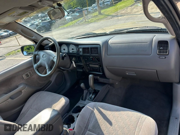 2002 Toyota Tacoma z VIN 5TEPM62N42Z897969, wystawiony jako Copart lot #60794585 z przebiegiem 138 463 mil mil oraz Czysty tytuł • Clean title. Historia ofert i sprzedaży dostępna na DreamBid. Obrazek 7.