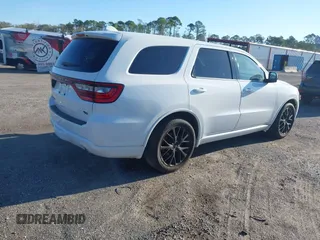 2015 Dodge Durango R/T with VIN 1C4SDHCT7FC873768, listed as a IAAI auction lot 41814710 with 130,237 mi miles and . Bid and sale history available at DreamBid. Image 4.
