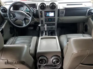 2003 Hummer H2 z VIN 5GRGN23U43H137876, wystawiony jako Copart lot #48081145 z przebiegiem 128 703 mil mil oraz Tytuł czysty. Historia ofert i sprzedaży dostępna na DreamBid. Obrazek 8.