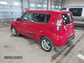 2011 Kia Soul + with VIN KNDJT2A23B7329051, listed as a IAAI auction lot 41963566 with 146,063 mi miles. Bid and sale history available at carsss.com. Image 3.